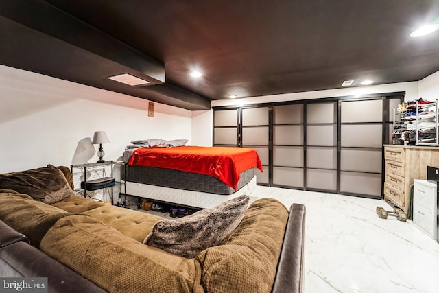 bedroom featuring recessed lighting, visible vents, and marble finish floor