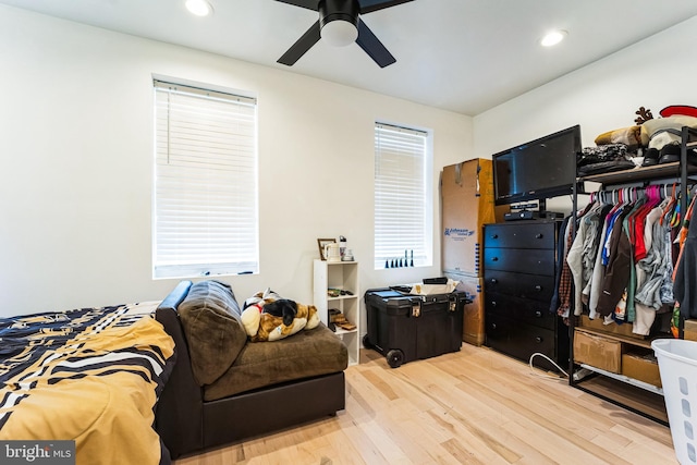 bedroom with light wood-style flooring, recessed lighting, and ceiling fan