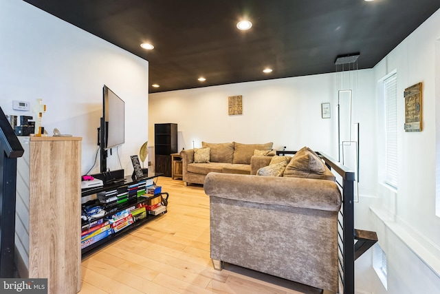 living room featuring recessed lighting and light wood-style flooring