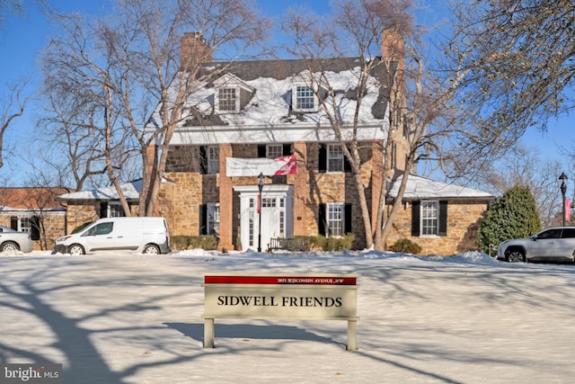 view of front of house with a chimney