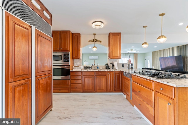 kitchen with built in appliances, marble finish floor, light stone counters, and brown cabinetry