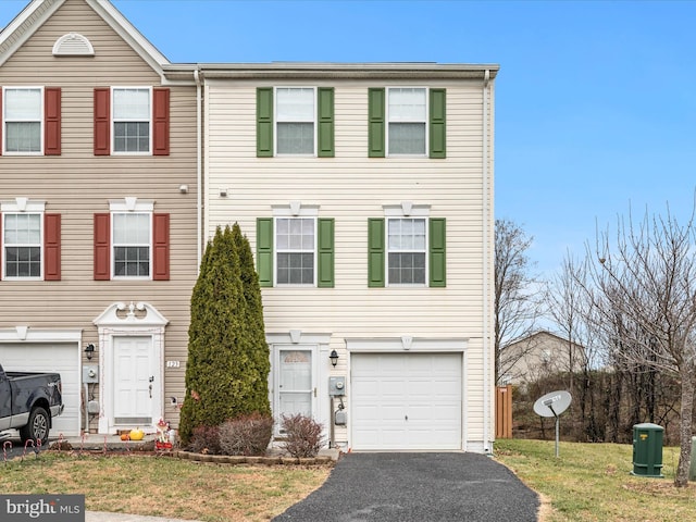 125 Monticello Sq, Winchester, VA 22602 - townhome / multi-family property featuring aphalt driveway and a garage