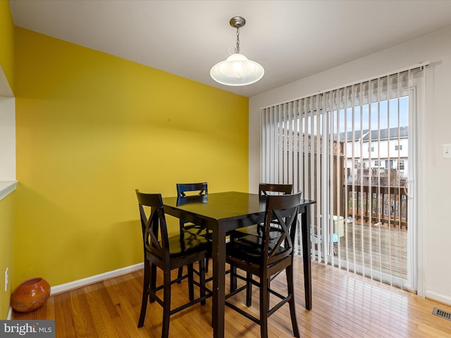 125 Monticello Sq, Winchester, VA 22602 - dining space with visible vents, light wood-style flooring, and baseboards