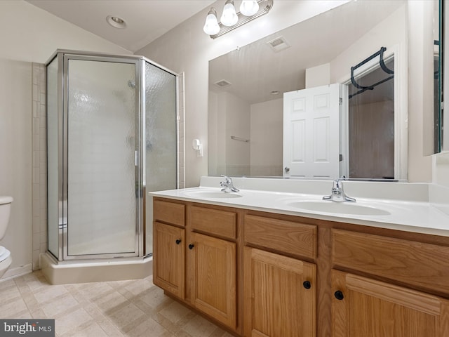 125 Monticello Sq, Winchester, VA 22602 - bathroom featuring a sink, toilet, and a shower stall