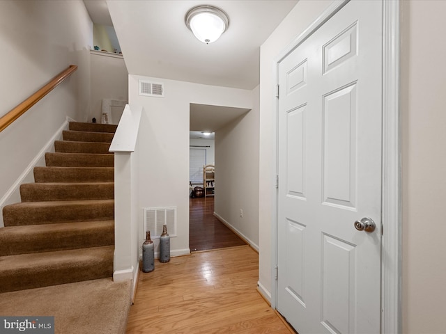 125 Monticello Sq, Winchester, VA 22602 - interior space featuring stairway, light wood-style flooring, baseboards, and visible vents