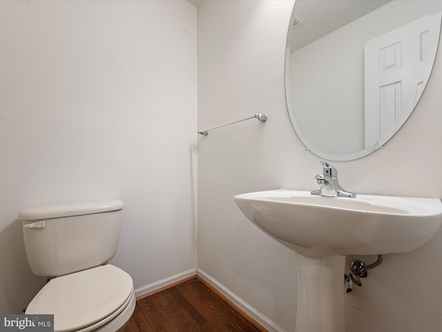 125 Monticello Sq, Winchester, VA 22602 - bathroom featuring toilet, baseboards, and wood finished floors