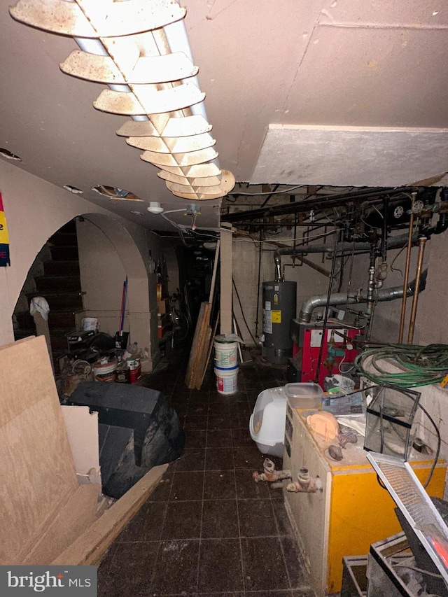 unfinished basement with water heater