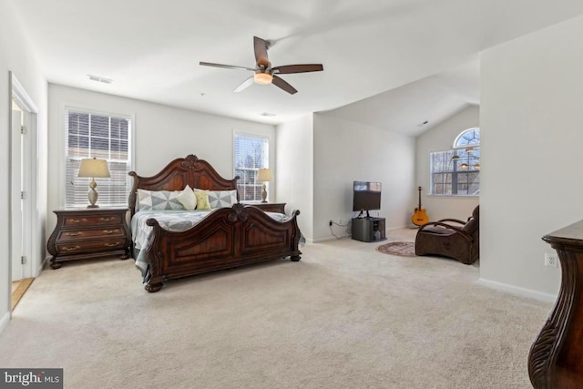 bedroom with a ceiling fan, visible vents, carpet floors, and baseboards