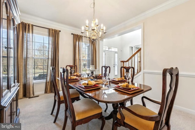 dining area featuring a wealth of natural light, light carpet, and crown molding