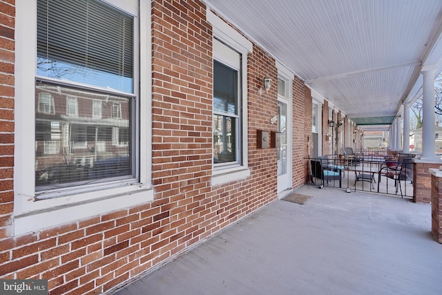 view of patio featuring a porch