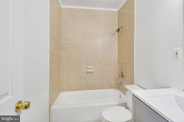 bathroom with tub / shower combination, vanity, and toilet