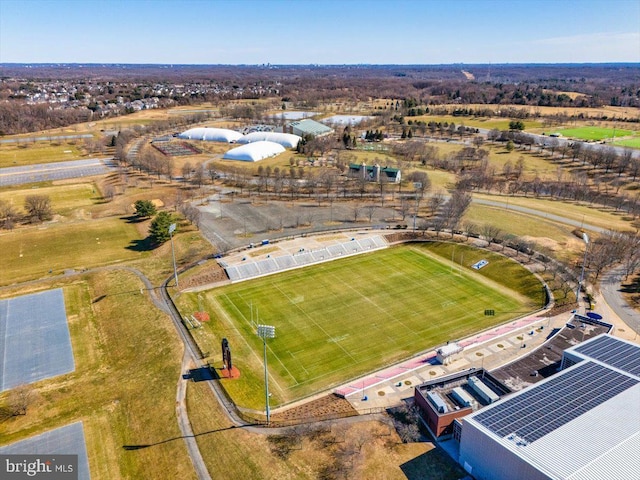 birds eye view of property with a rural view