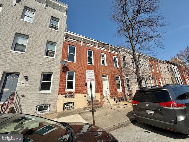 view of building exterior featuring entry steps