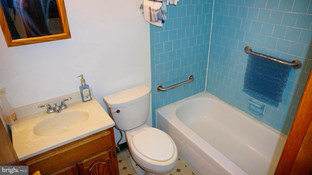 bathroom featuring shower / bath combination, toilet, and vanity