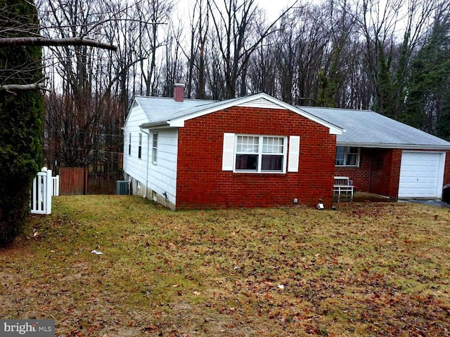 view of property exterior with central air condition unit, fence, a garage, brick siding, and a chimney