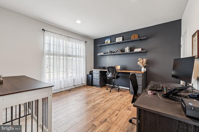 office area featuring light wood-style flooring