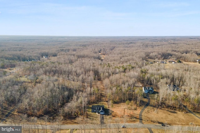 aerial view with a wooded view