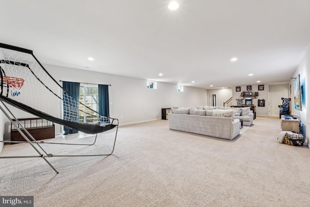 living area featuring stairs, baseboards, carpet flooring, and recessed lighting