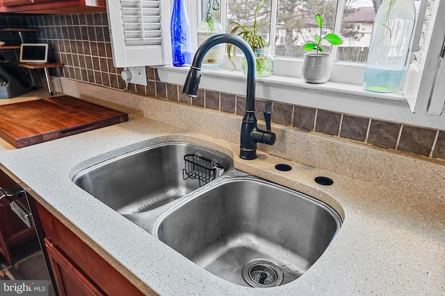 interior details featuring a sink