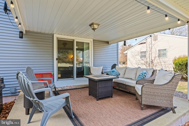 view of patio with an outdoor living space and a wooden deck