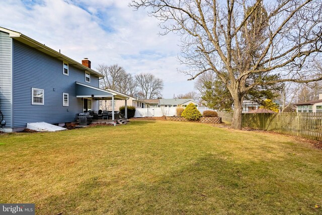 view of yard featuring a fenced backyard