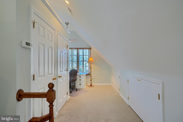 bonus room featuring lofted ceiling and carpet