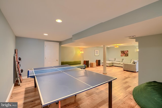 game room featuring visible vents, recessed lighting, baseboards, and hardwood / wood-style floors