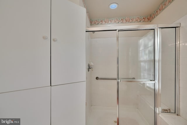 full bath featuring a stall shower