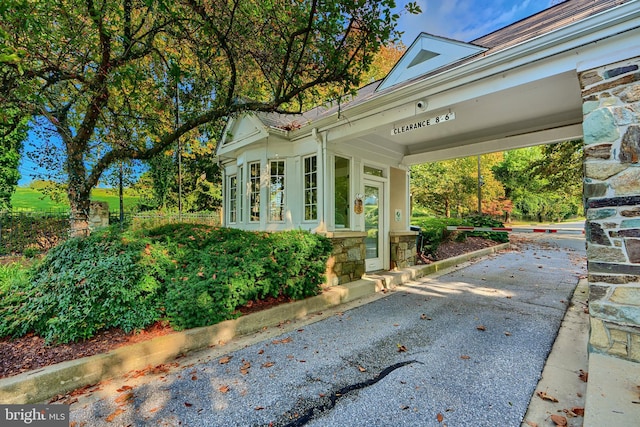 view of home's exterior featuring stone siding