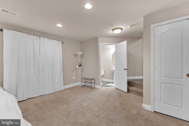 unfurnished bedroom featuring recessed lighting, baseboards, visible vents, and carpet flooring