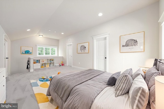 carpeted bedroom with recessed lighting and vaulted ceiling