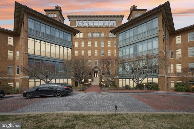 view of property at dusk