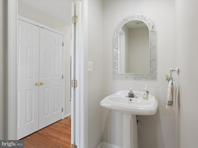 bathroom featuring wood finished floors