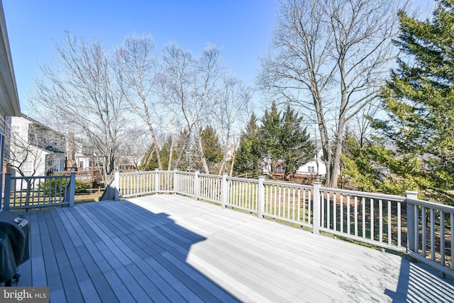 wooden deck with area for grilling