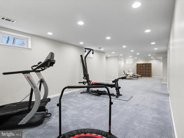 workout area with recessed lighting, visible vents, baseboards, and carpet