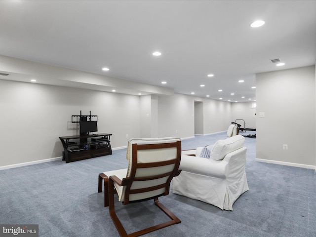 carpeted living area with visible vents, recessed lighting, and baseboards