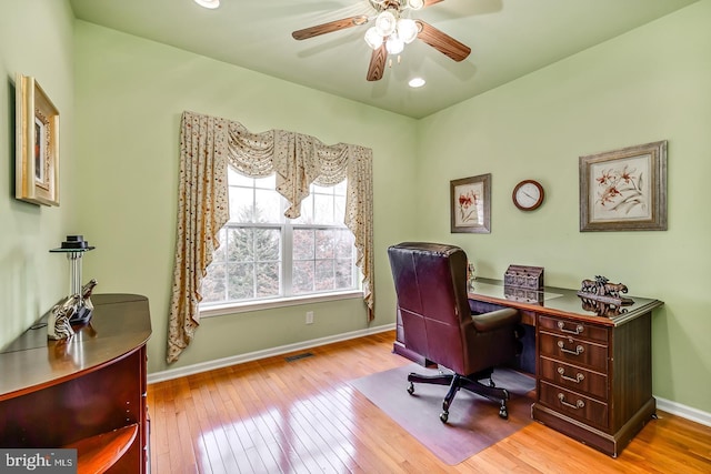 office area with ceiling fan, wood-type flooring, and baseboards