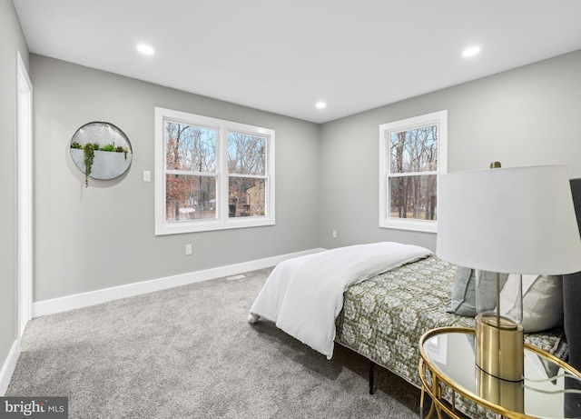 bedroom with recessed lighting, carpet flooring, and baseboards