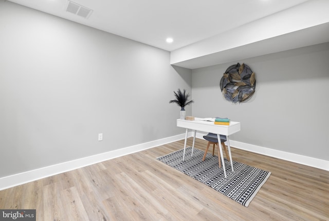 office featuring recessed lighting, wood finished floors, visible vents, and baseboards