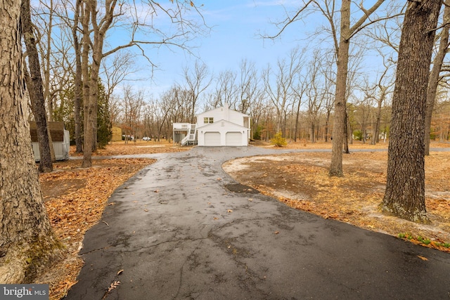 view of street featuring driveway