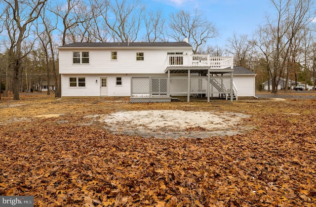 view of front of home featuring a wooden deck