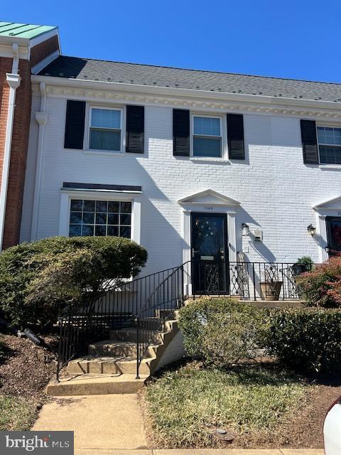 multi unit property featuring brick siding