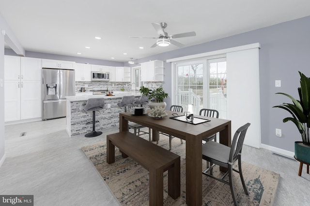 dining area with a ceiling fan, recessed lighting, visible vents, and baseboards