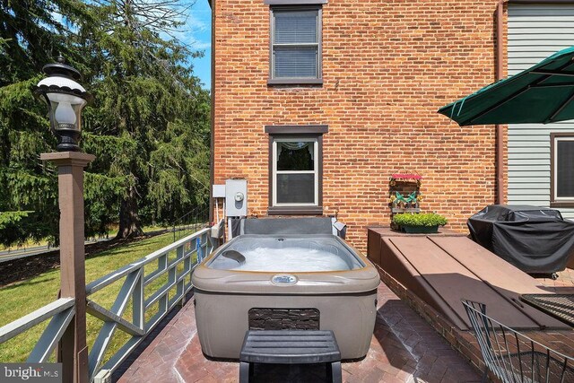 view of patio with a grill