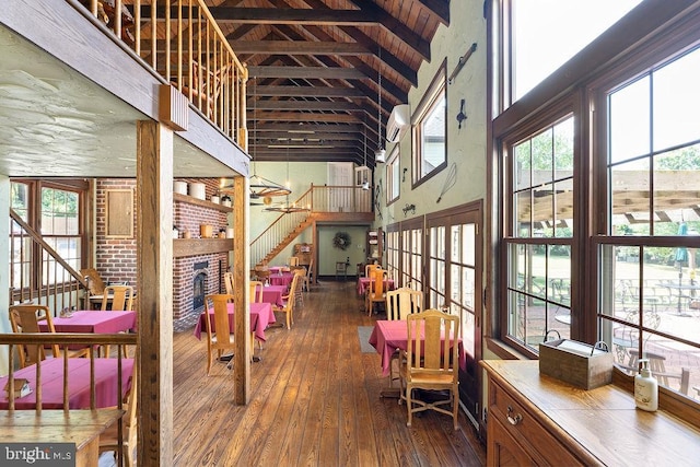 interior space with stairway and a wall mounted AC