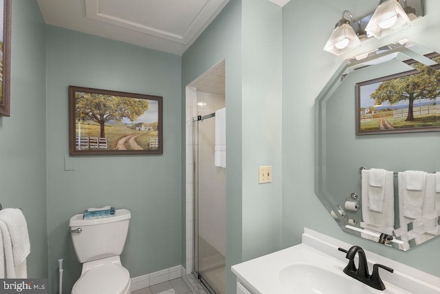 full bath with tile patterned flooring, toilet, vanity, baseboards, and a stall shower