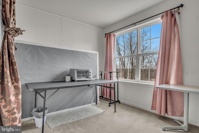 office area featuring a toaster, carpet flooring, plenty of natural light, and baseboards