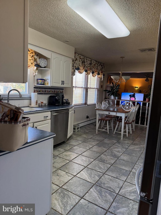 kitchen featuring a sink, visible vents, white cabinets, dishwasher, and open shelves