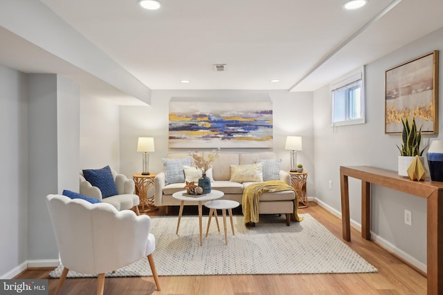 interior space with recessed lighting, baseboards, and wood finished floors