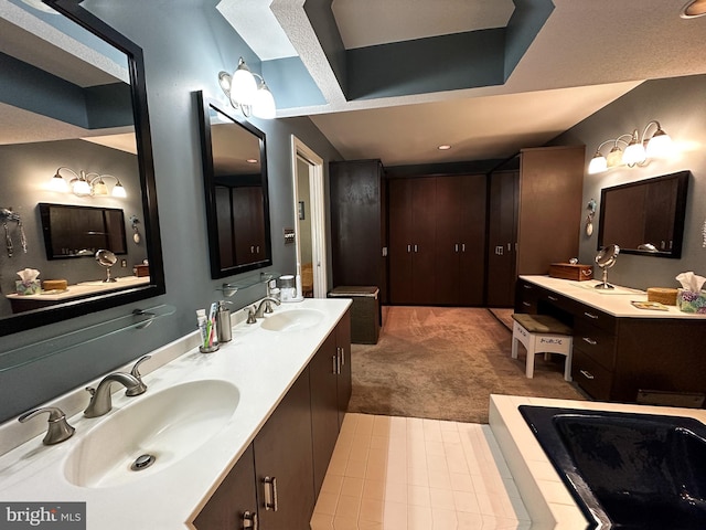 bathroom with double vanity and a sink